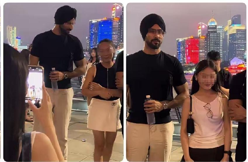 这个印度人回老家可以吹一辈子牛了！来了中国一趟，女生排队和他合影！