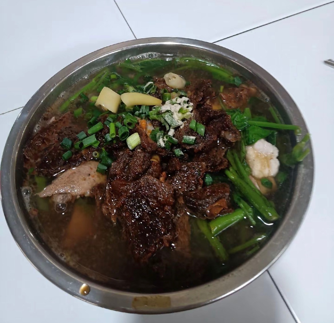 梧州归义煲粉梧州美食攻略梧州美食知道 广西梧州岑溪归义煲粉里面是猪肺，归义市场里