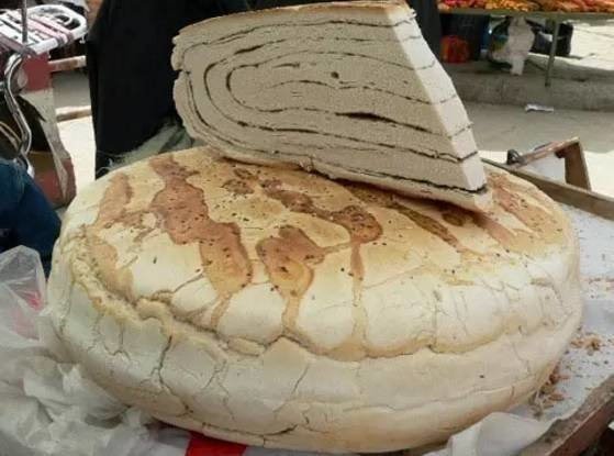 单亲妈妈14年手打200万个锅盔看到这个单亲妈妈14年手打200万个锅盔的新闻真