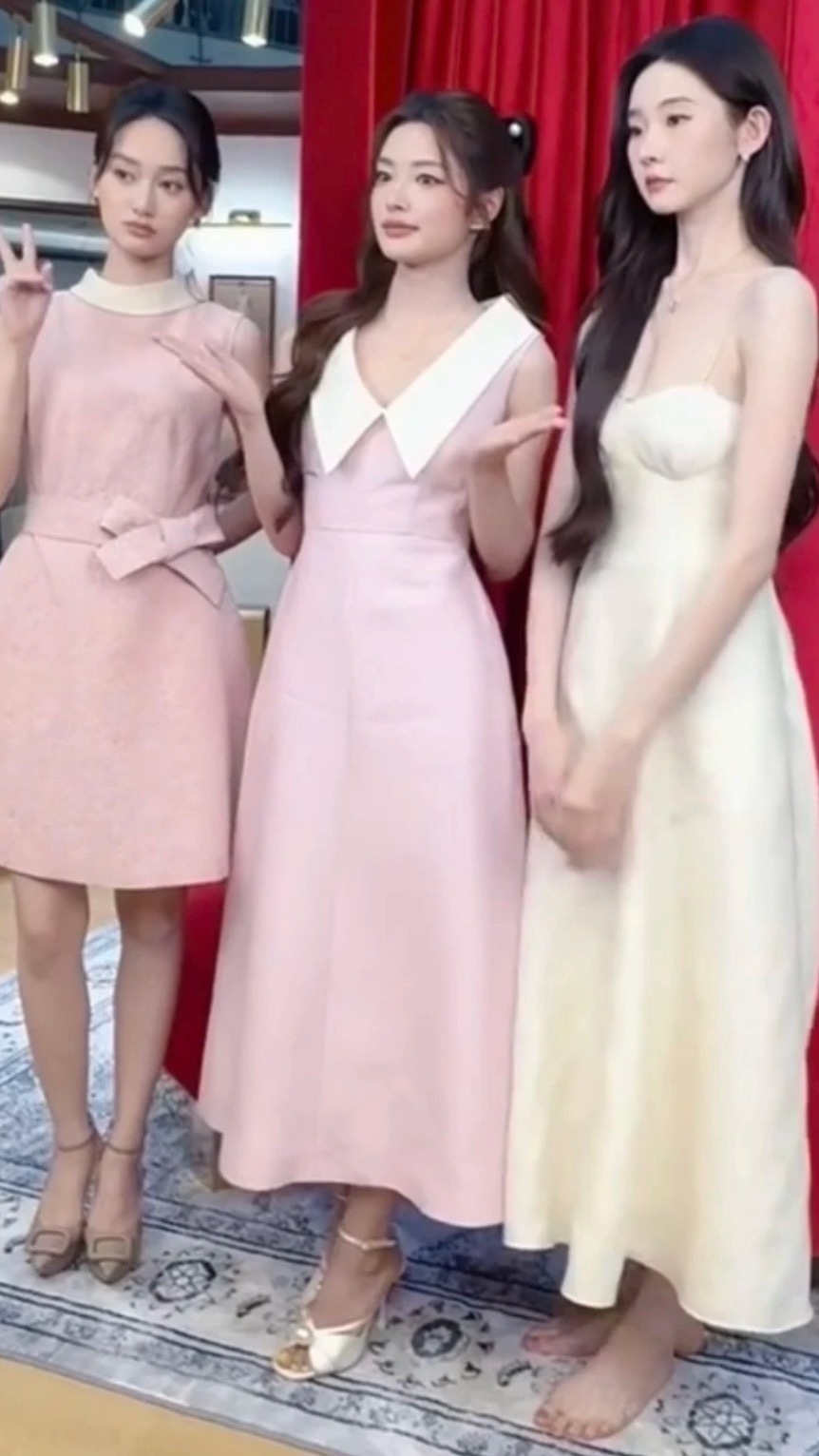 张艺凡光脚与徐若晗夏梦合照品牌活动同框的徐若晗、张艺凡、夏梦，本来穿着高跟鞋的张