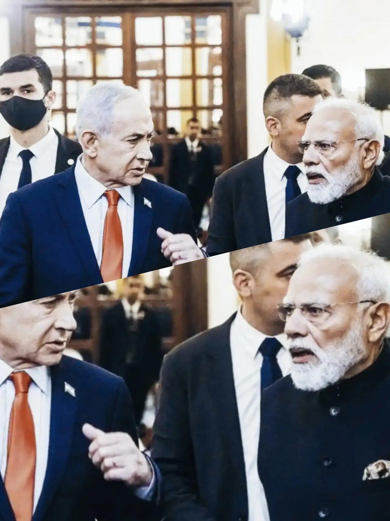 莫迪的表情是什么意思呢？
莫迪和内塔尼亚胡在交流什么话题呢？
莫迪的表情是被惊呆