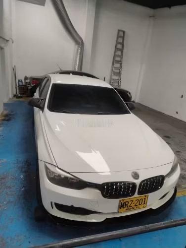 哥伦比亚的宝马320手动挡，这是2013年上的牌，跑了十一万公里，此车要价折合人