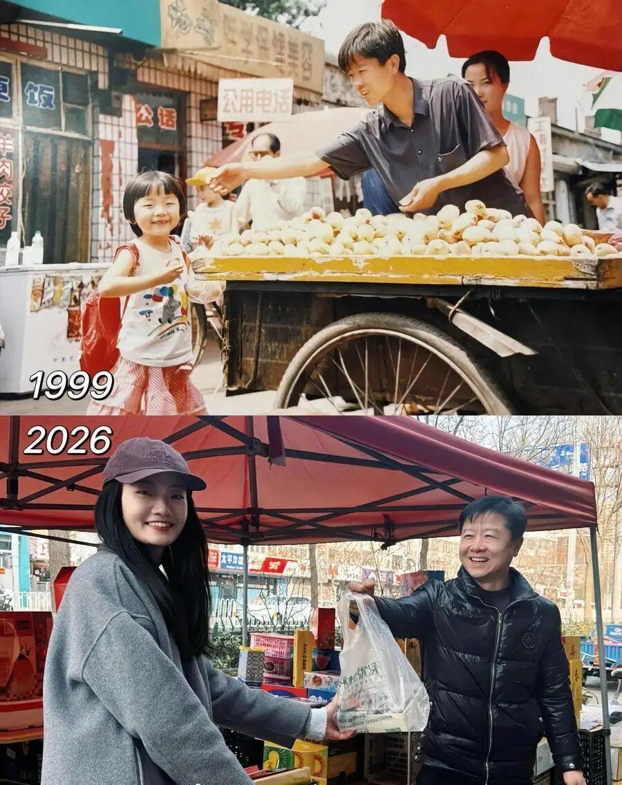 1999年，太原街头的水果摊前，3岁小女孩接过摊主递来的一颗杏，父亲拿起相机拍下
