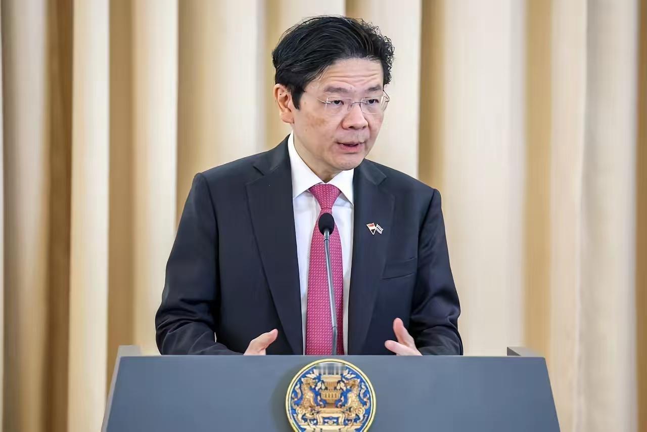新加坡总理黄循财在接受华尔街日报采访的时候，居然对中国内政妄加评论！

说白了，