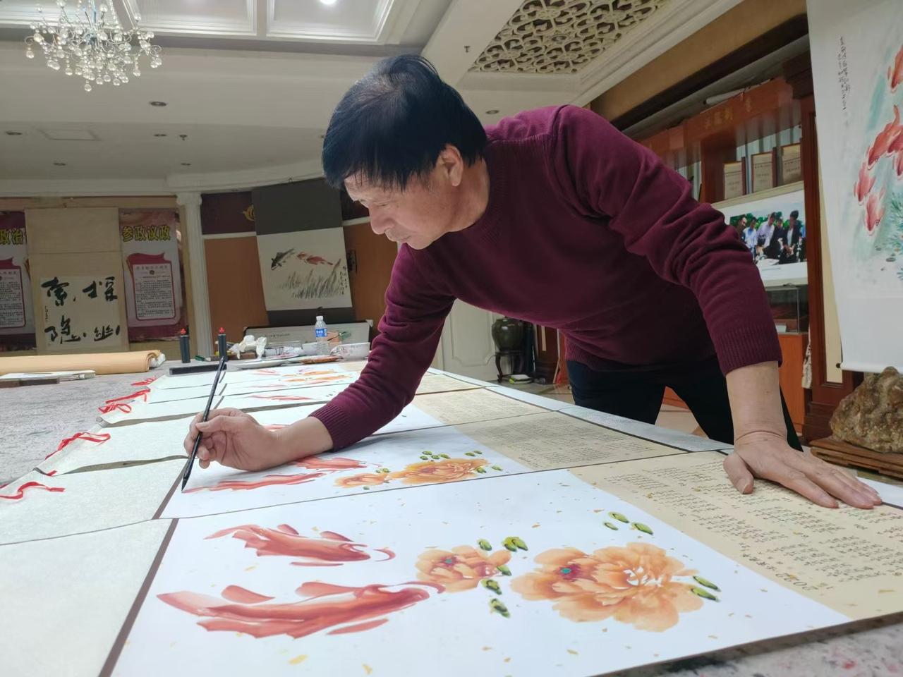 分享一张最近随手拍的照片马杰画鱼
