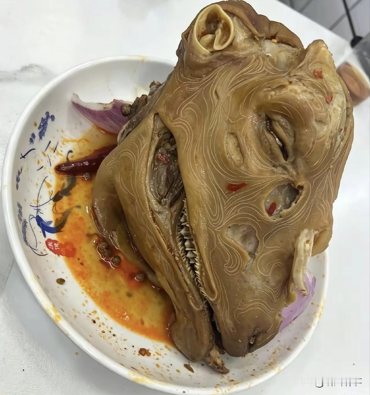 你问我答问的有人喜欢吃羊头吗，看着都恐怖！