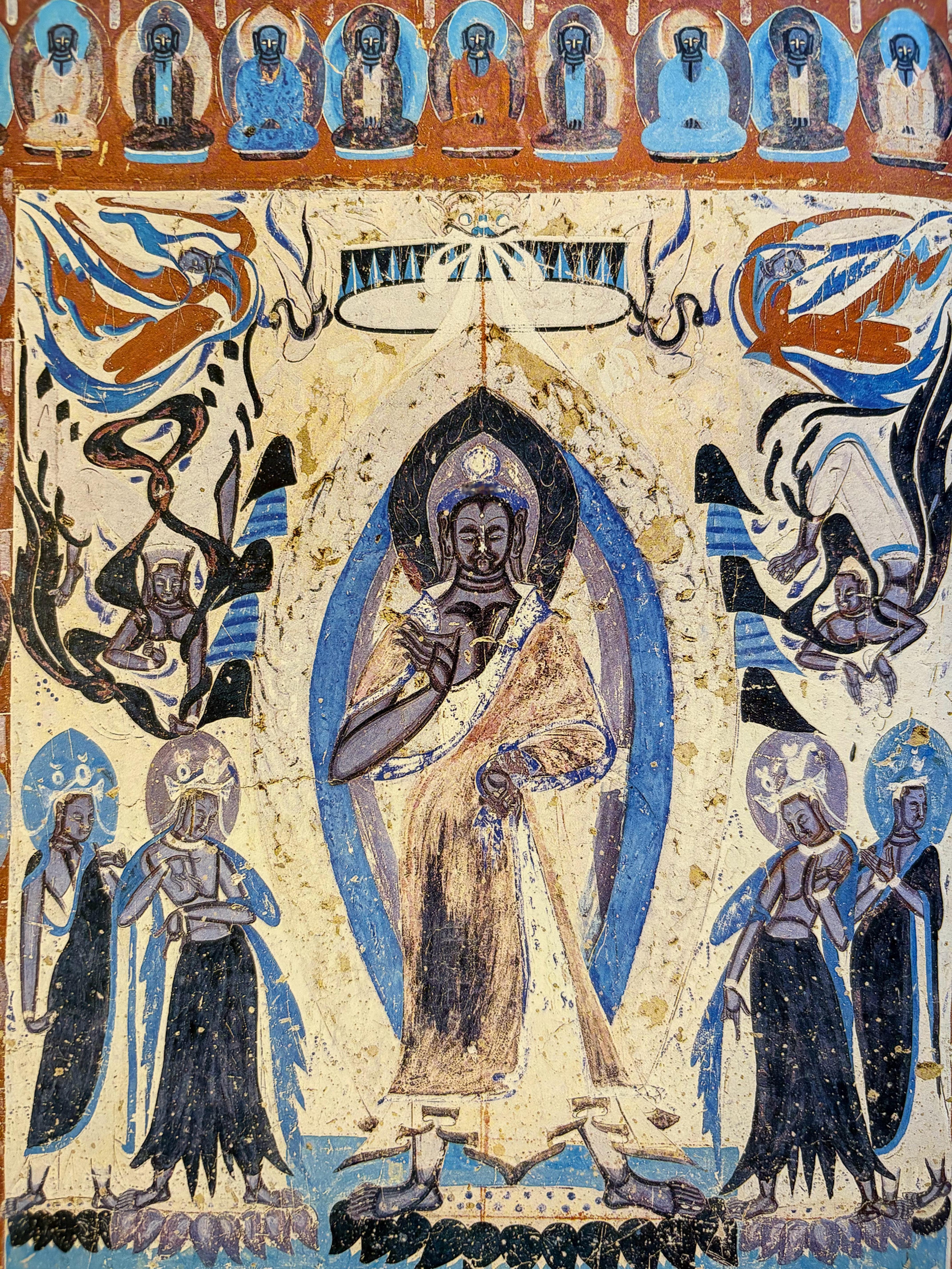 敦煌莫高窟第249窟的西魏时期彩绘壁画《说法图》 两侧的四身飞天非常精彩. 狭义