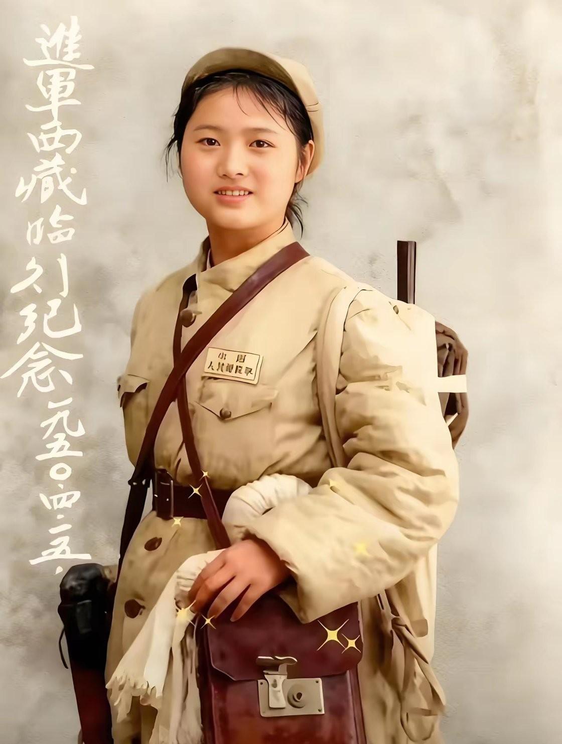 1950年4月5日，这是这名年轻貌美的女兵进军西藏时的临别纪念照。

照片上的姑