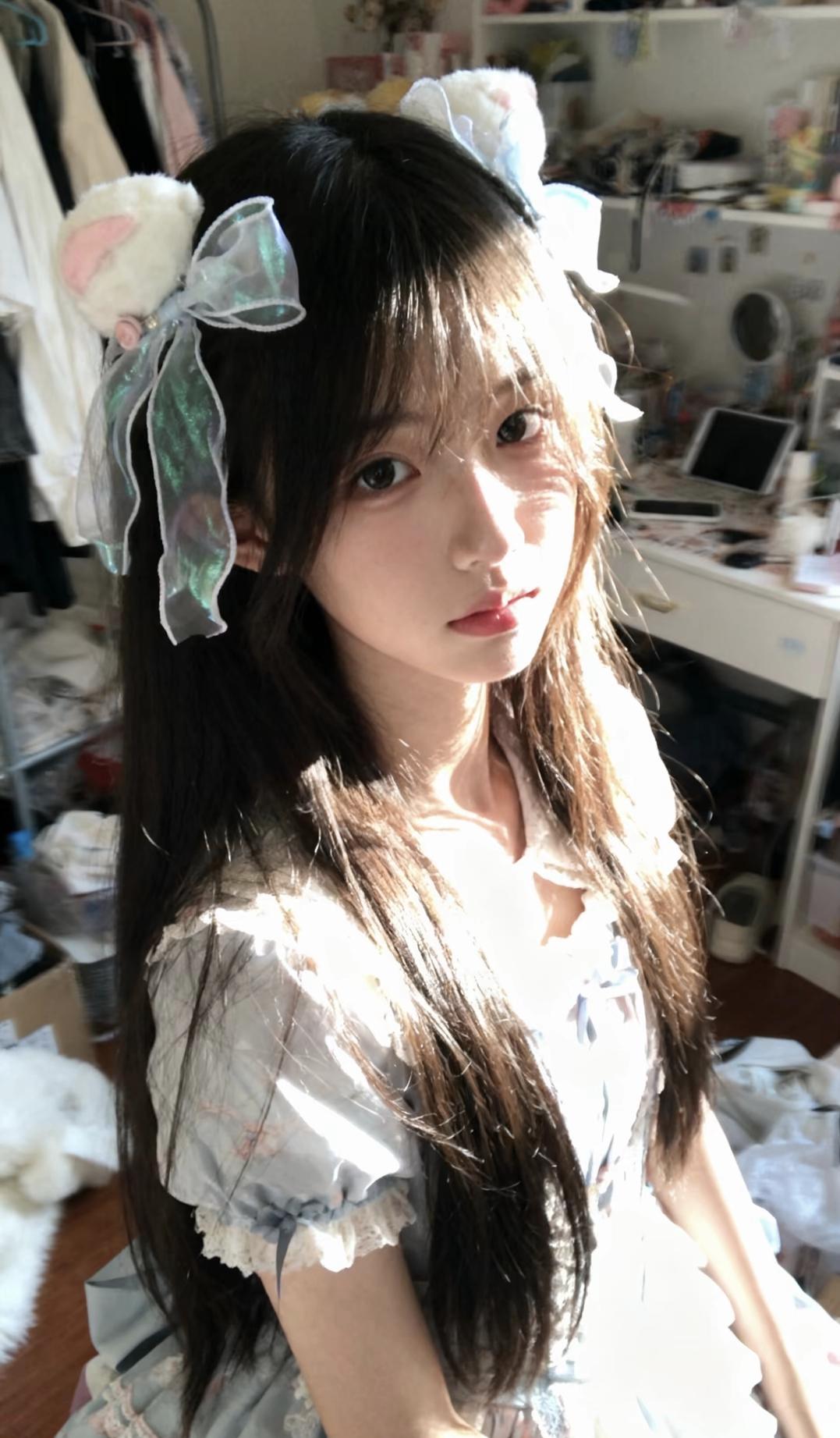 戴蝴蝶结的可爱女孩分享唯美的美照