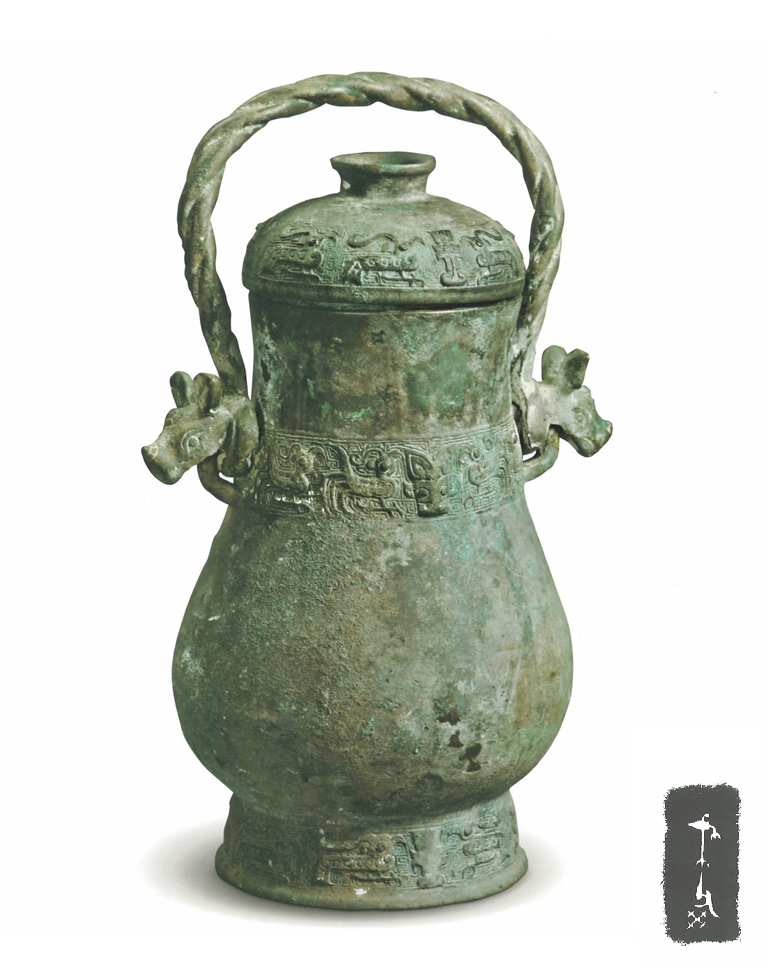 陕西泾阳县博物馆藏1991年泾阳高家堡M3出土西周早期:戈父癸壶. 绳索状提梁两