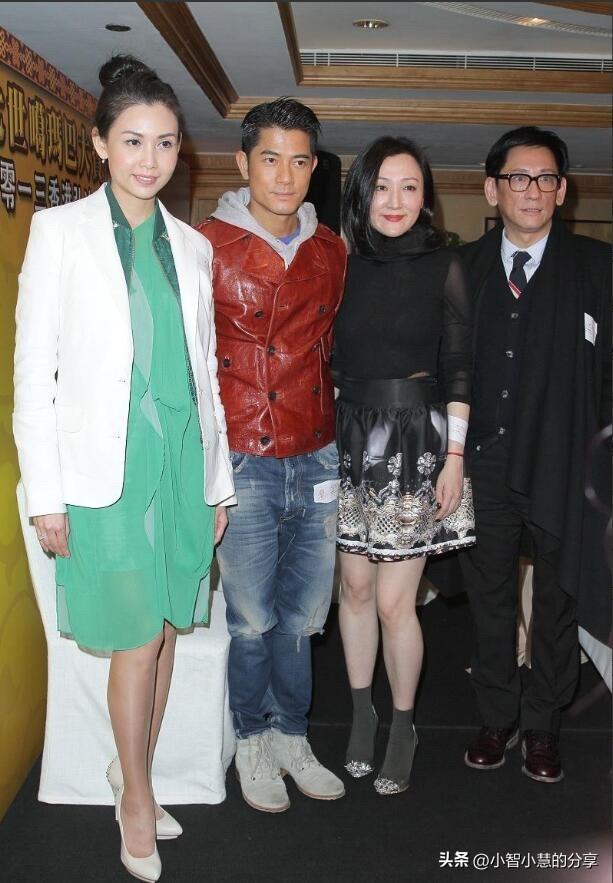 郭富城旁边的这一个女明星颜值太出众了，看样子她的身高比郭富城还要高一点点，脸巨小