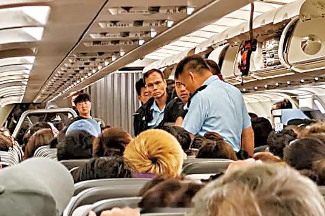 香港执法香港刑法香港监狱 「抵達香港航班現機艙老鼠 （涉嫌盜竊罪犯）..一名57