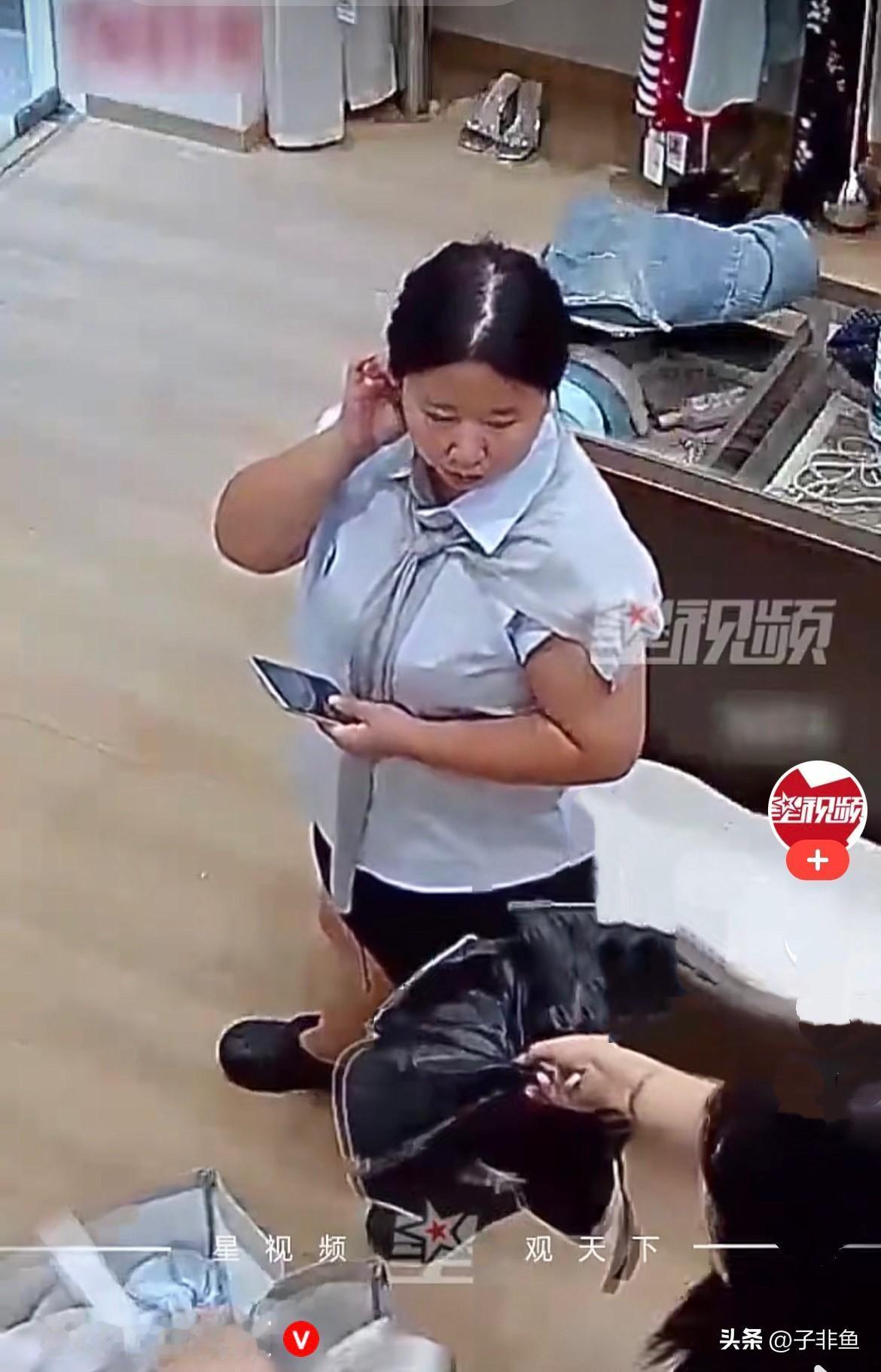 近日，江西抚州台风来袭，暴雨倾盆，一位女子路过街边服装店，大雨实在躲不开，便礼貌