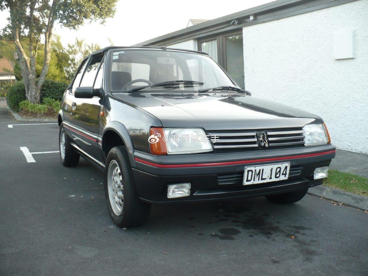 标致205敞篷，这车装备了1.6升发动机，没看懂是不是后换的增压引擎~说是车身经