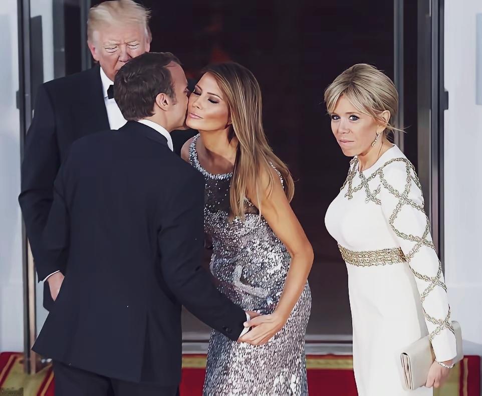 都是西方礼节。那天，马克龙也亲亲特朗普的老婆，马克龙夫人视而不见，特朗普看着有点