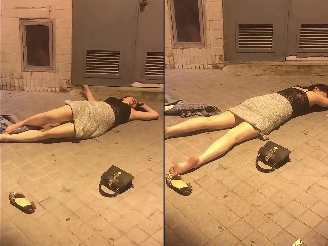 凌晨2点的街头，冷风吹着路面，一个醉酒女子直挺挺躺在那儿，身边连个人影都没有。