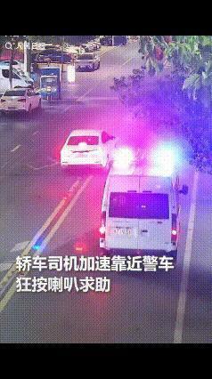 浙江一警车正在巡逻，突然一轿车加速靠近，狂按喇叭将警车截停！民警打开窗户，就听到
