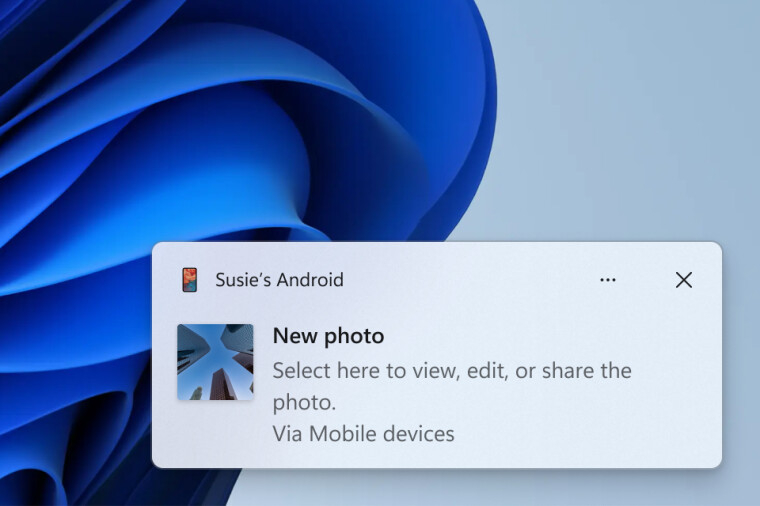 Windows 11 手机连接功能已经开始加入“新图片”通知功能，点击通知，可以