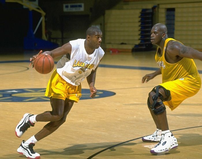 Magic Johnson and Shaquille O'Neal 