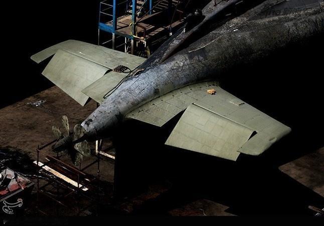 烽火问鼎计划每天认识一件兵器 一般认为，潜艇X形艉舵布局相较于传统十字形艉舵的一