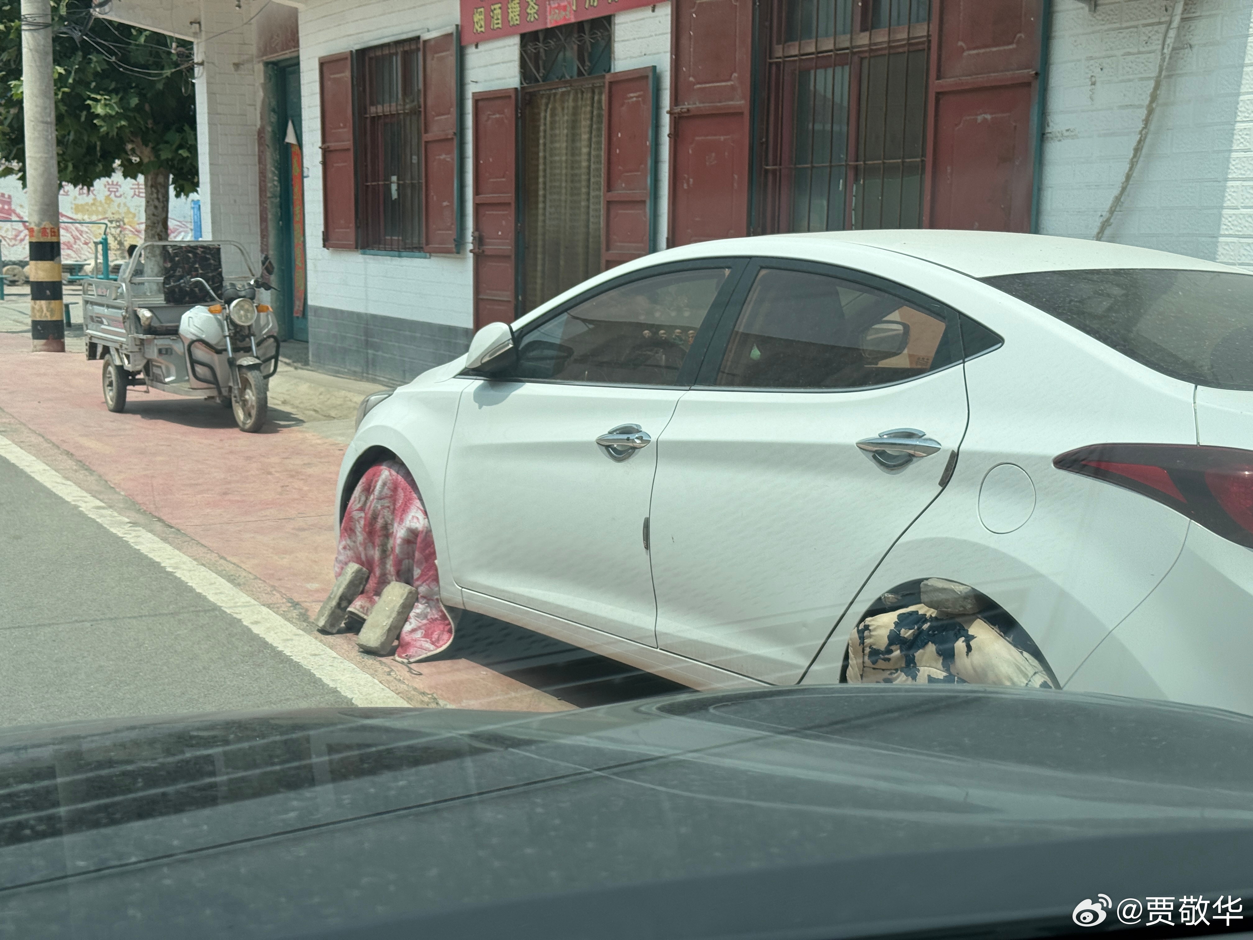 果然是高手在民间啊，这是怕轮胎热坏了吗？ 