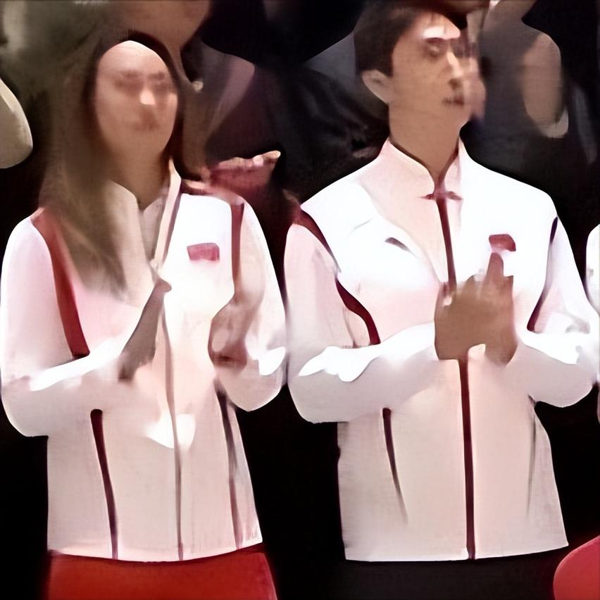 11月9日，广州，全国体育先进受到亲切接见，图中的2位各省队的男女运动员是谁呢？