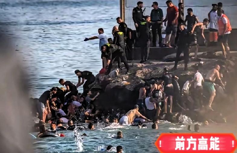 面对汹涌而来的移民潮，西班牙当局保持冷静应对。休达大量本地商铺选择闭门避险，涌入