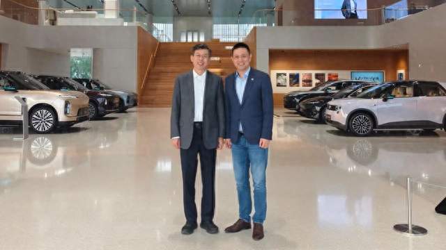 张永伟理事长与蔚来创始人李斌座谈交流