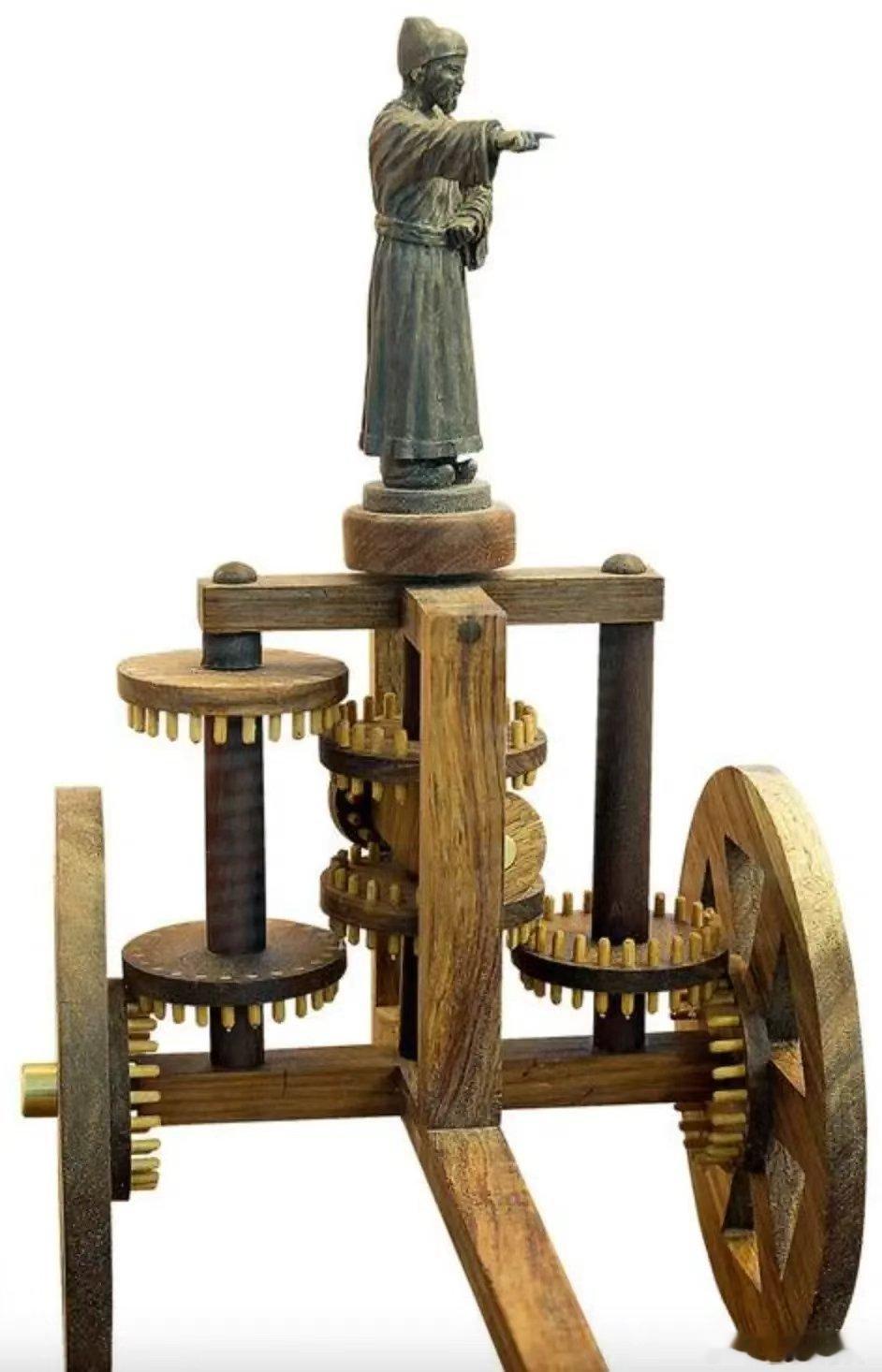 依据《宋史》成功复制的指南车指南车利用差速齿轮原理、无论车辆如何转向都能使车上木