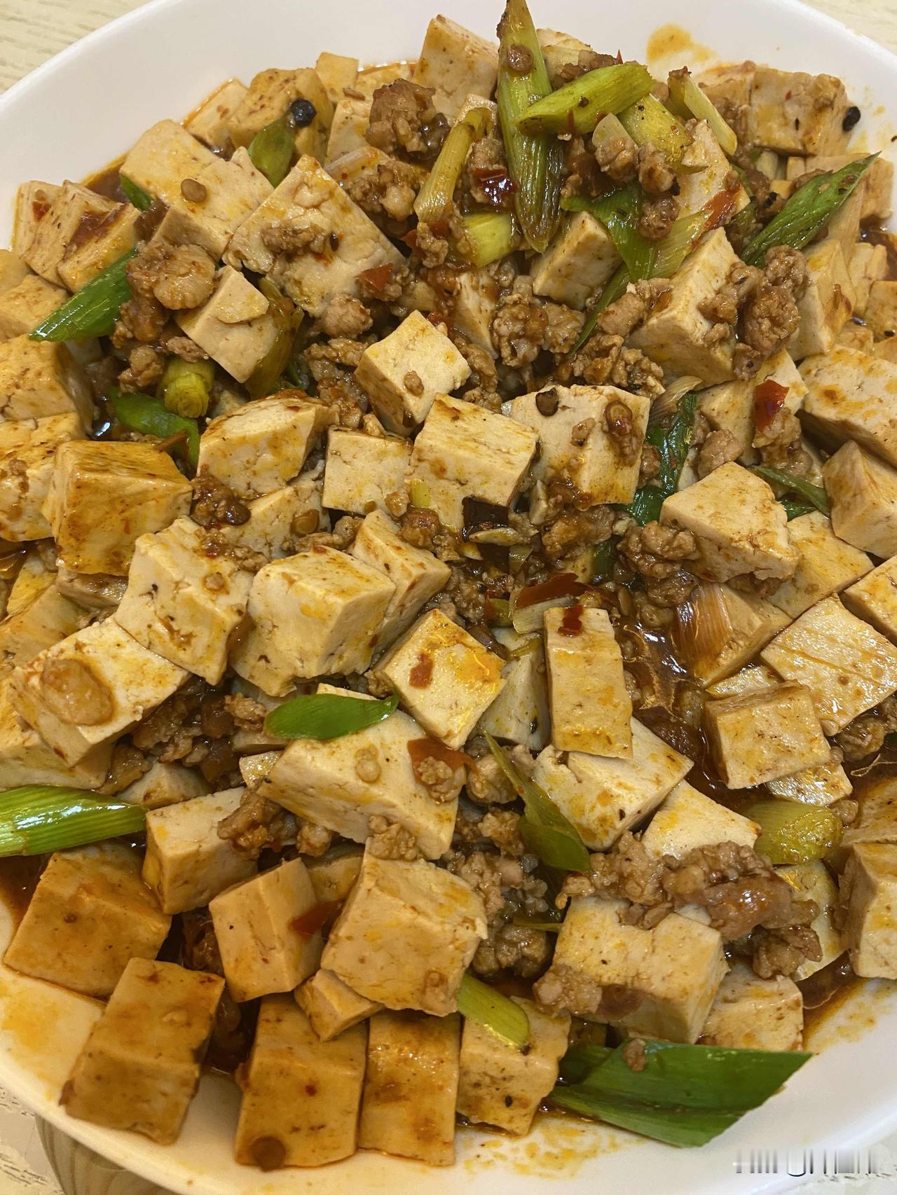 我做的麻婆豆腐
，老婆评价比厨子好，除了汤略少