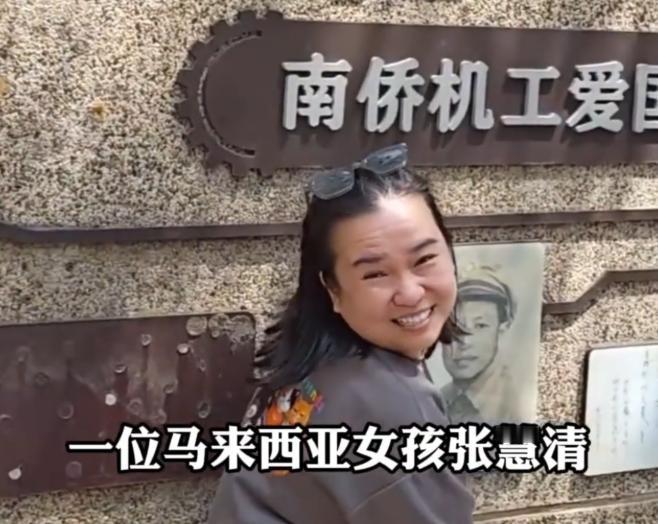 看哭了！马来西亚一名女孩到昆明旅游，逛到新闻南路，看见一面墙。墙上刻着很多老照片