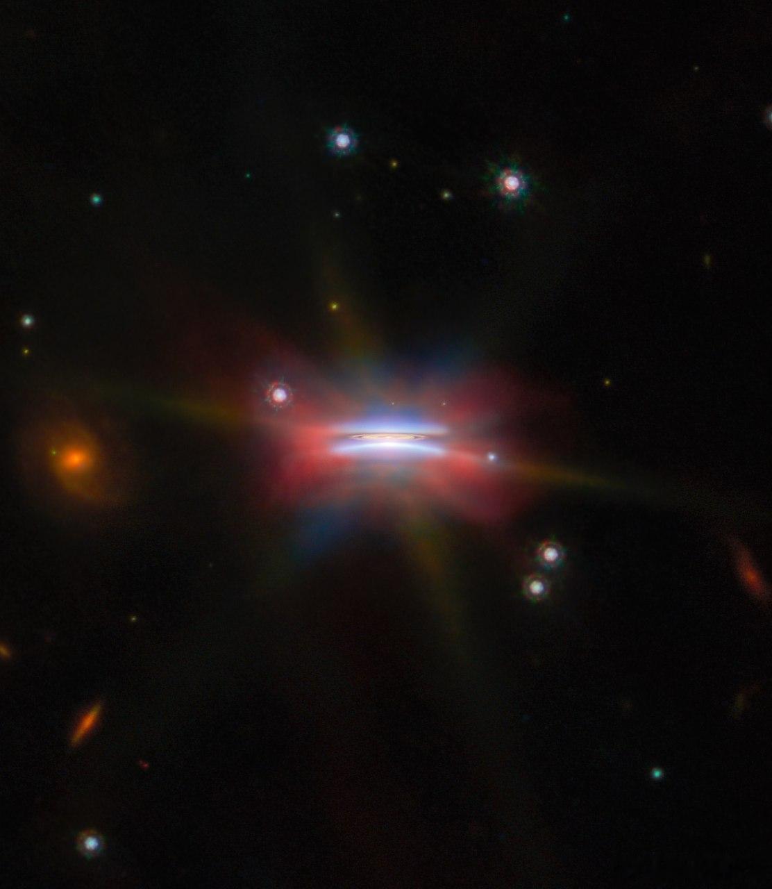 詹姆斯·韦伯太空望远镜拍摄的一对原行星盘：Oph 163131 和 Tau 04