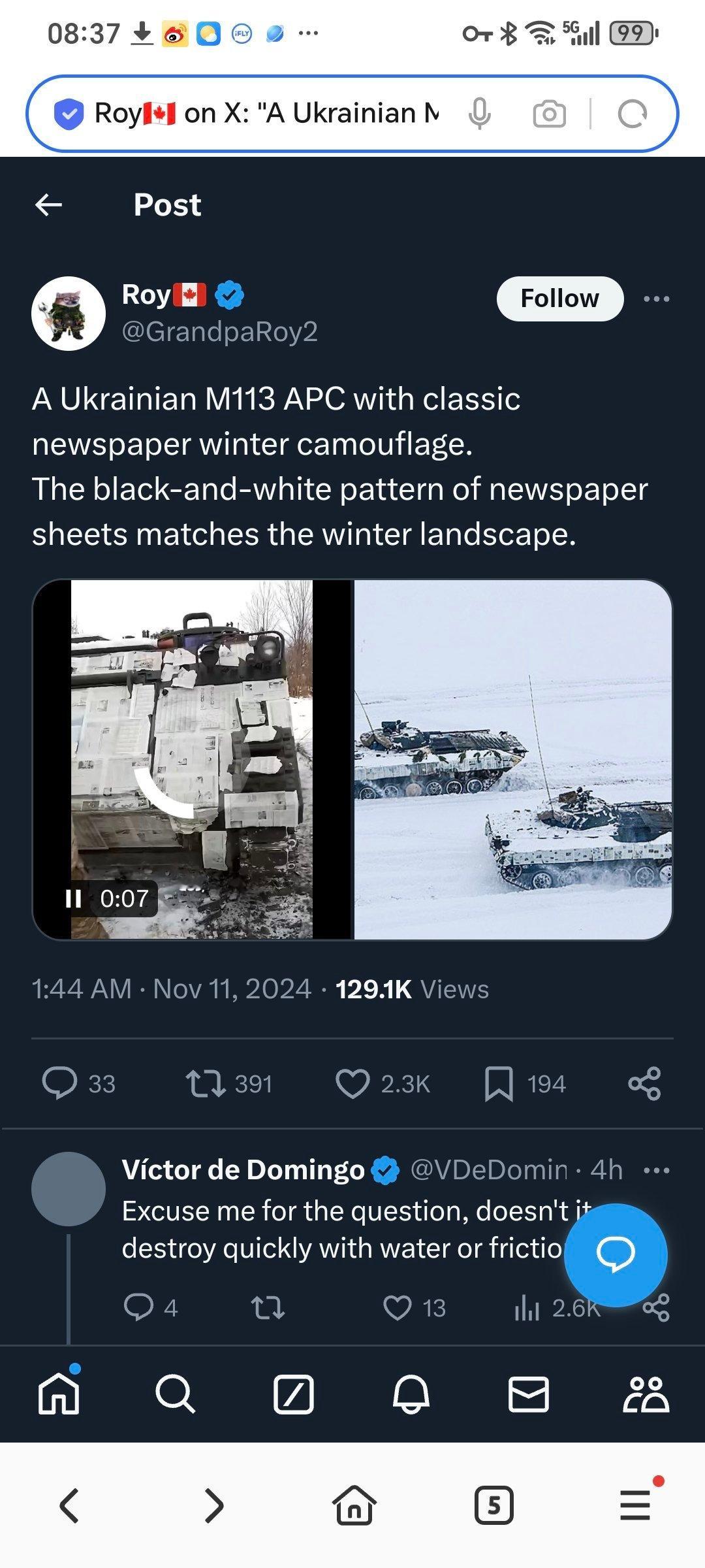 乌克兰 M113 装甲运兵车使用报纸制作冬季迷彩，报纸上的黑白图案与冬季的景色相