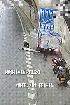 上人民日报了！5月6日，重庆，一辆货车停在隧道一侧，司机下来为货物加盖遮雨布，未