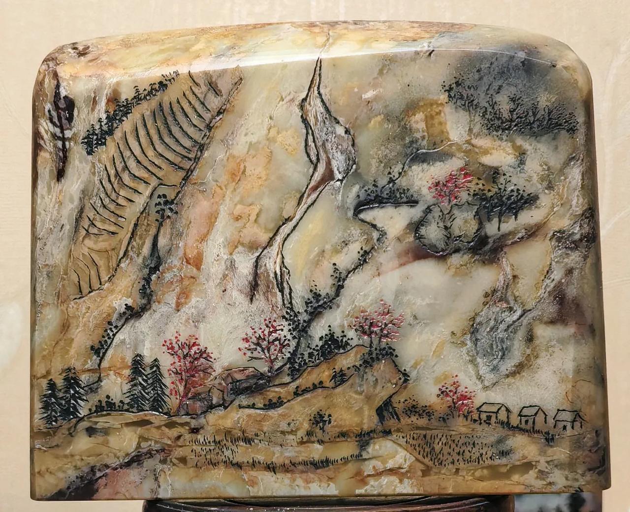 寿山石雕作品《黄河风情》赏析

这是一方寿山的虎岗石，石高11.5，宽13.3，