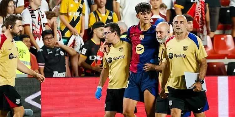 巴塞罗那的年轻球员马库斯·伯纳尔在巴萨2-1战胜巴列卡诺的西甲第三轮比赛中疑似膝