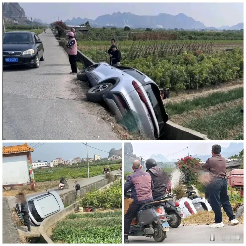 事发北流民乐罗政村，一辆小车意外掉落路边水沟，引起了不少路人驻足围观。从图片中可