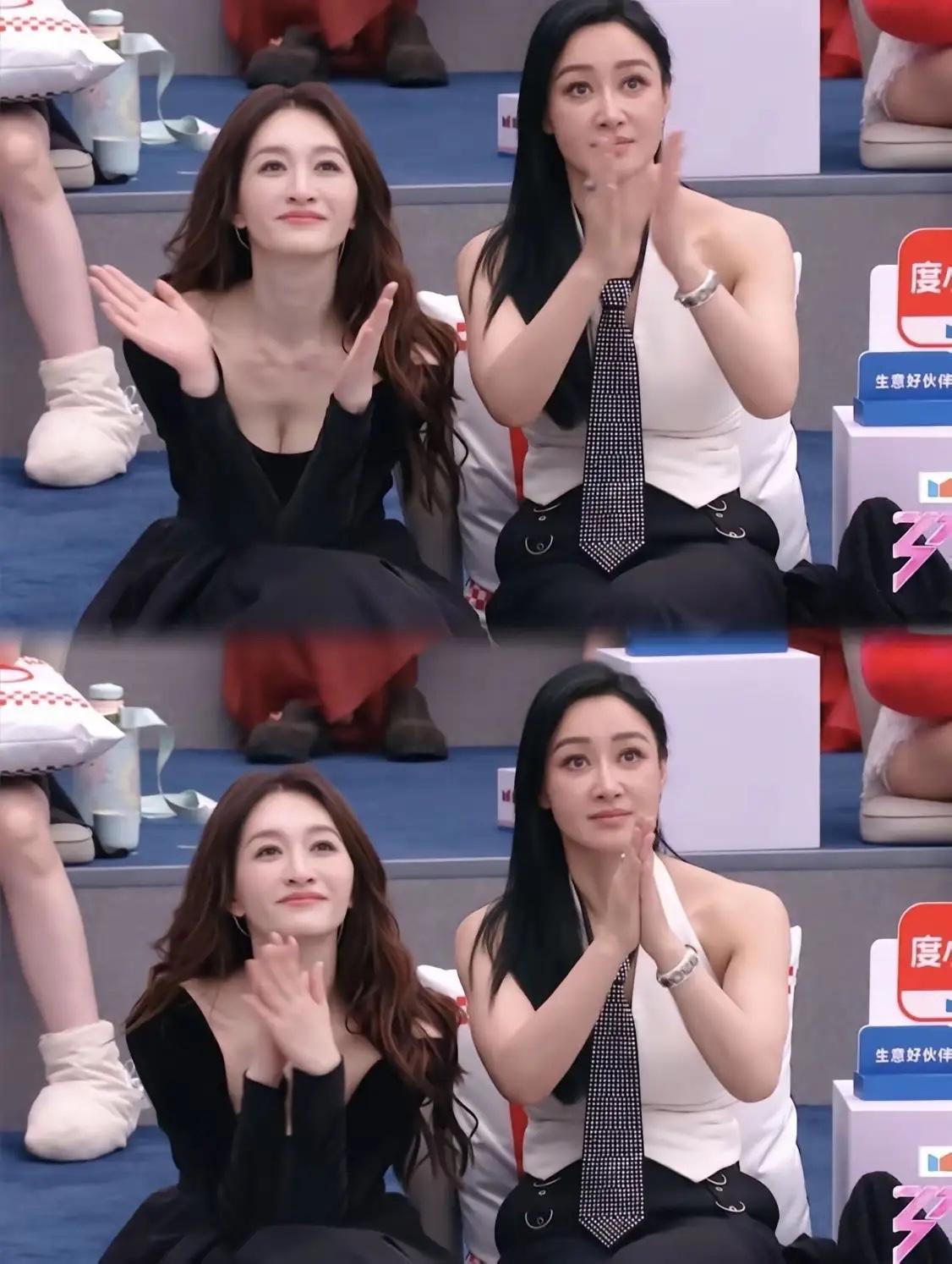 我一开始怀疑是光线的问题，

后来又觉得是黑色礼服衬得肤色更亮，直到看清镜头才彻