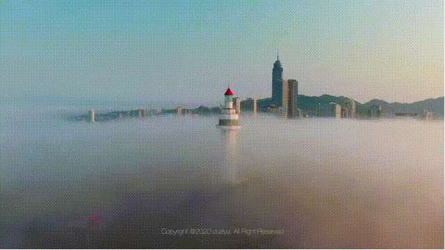 山东 烟台，自带仙气，海滋现象、海市蜃楼、平流雾三大奇观时常光顾，城市建筑在雾中