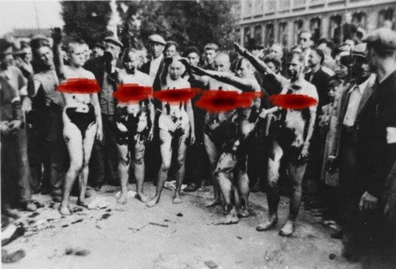 比利时人对在战争年代与德国人合作的当地妇女进行羞辱，1946年。
她们被公开剥光