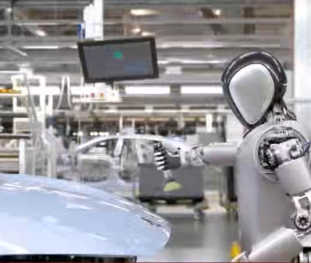 车间里，人形机器人精准操作汽车制造工序，技术正迈向商业化临界点，市场前景愈发广阔