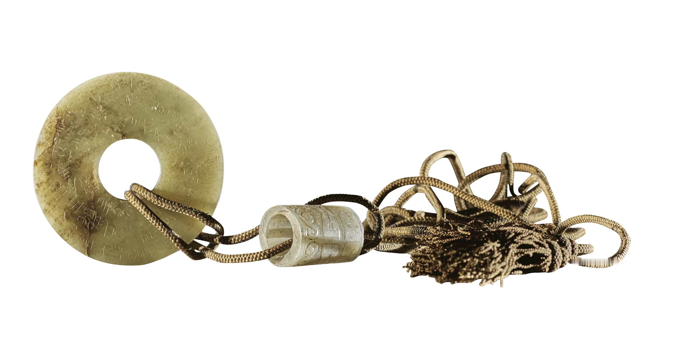 浙江台州黄岩区博物馆藏2016 年赵匡胤七世孙赵伯澐墓出土的五代南唐投龙玉璧。玉