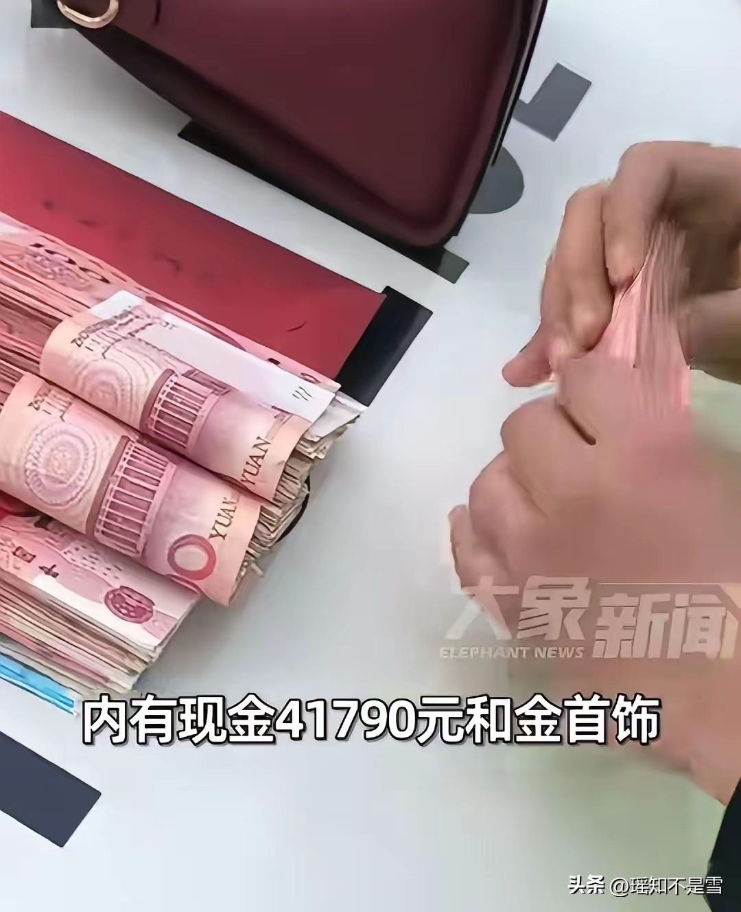 2月23日，江西南昌进贤服务区，一女子上完厕所洗手。余光瞥见，台边放着一个手提包