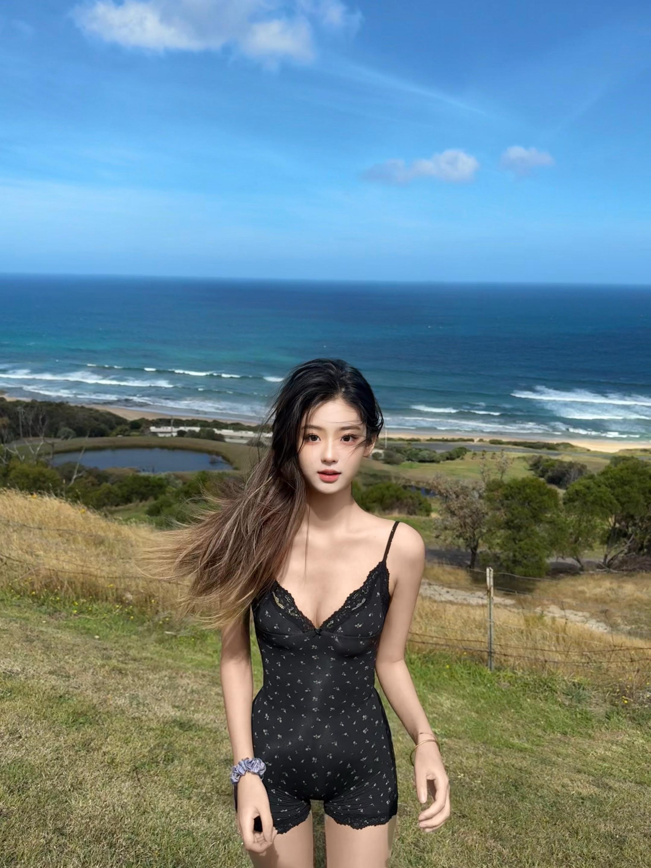 如果你觉得忧伤 就应该去澳洲 那里永远都是阳光 她也一直在你身边