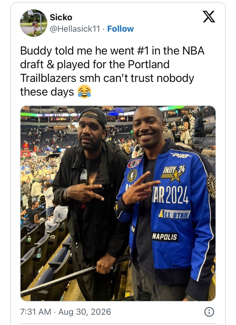 一球迷在网上晒出与奥登的合照，并写道：这家伙跟我说他是NBA选秀状元，还在开拓者