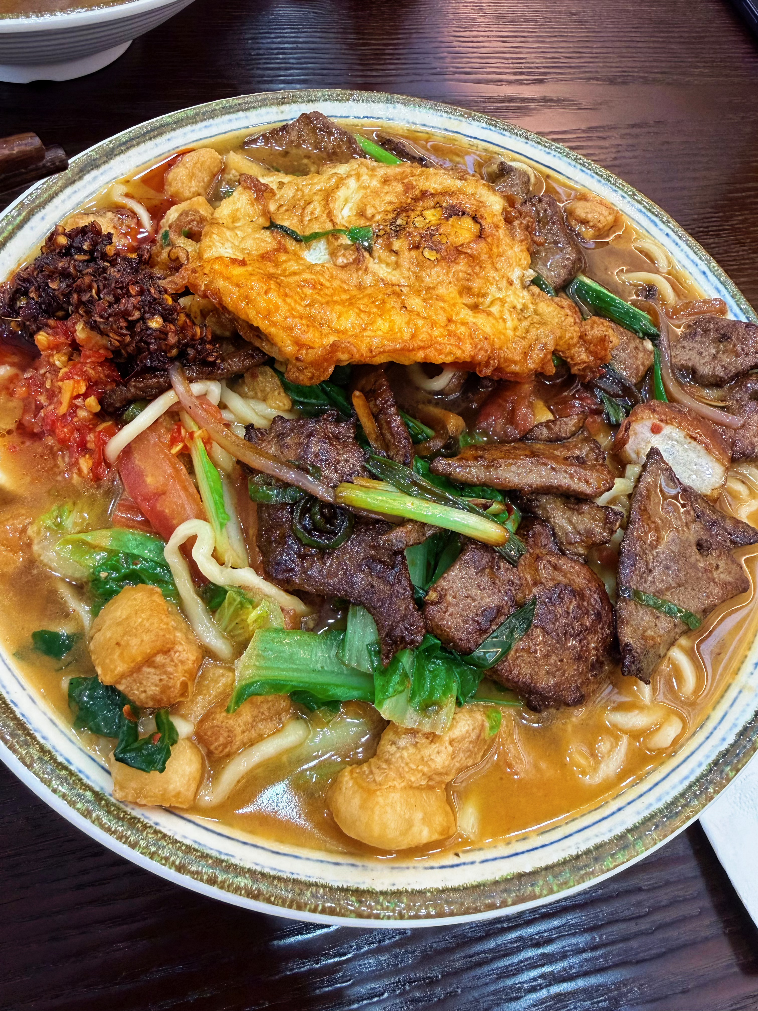 今天吃杭帮面 猪肝面加荷包蛋和油渣