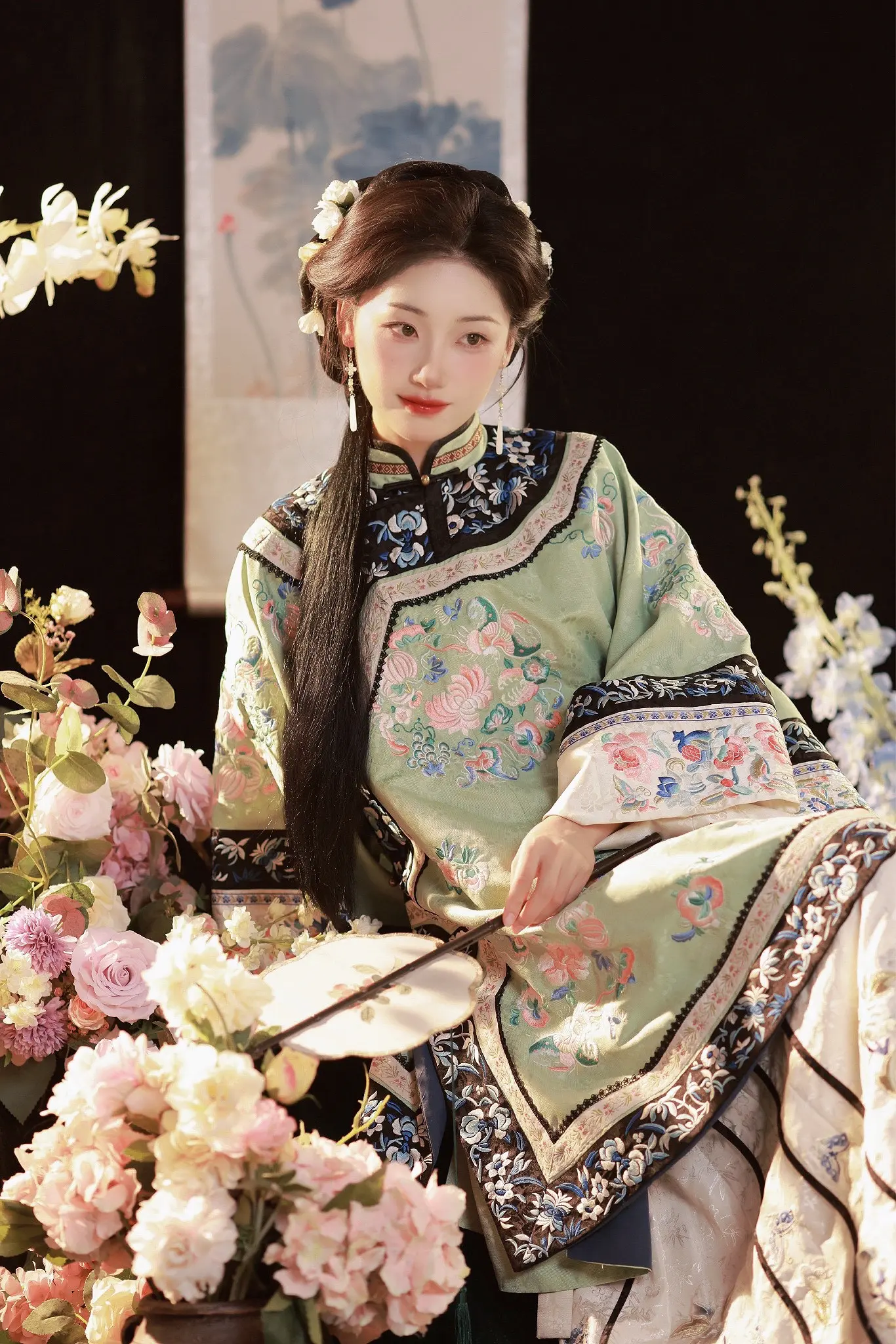 过客何须千千结。