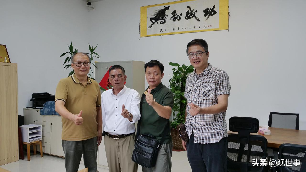 一张图片证明你的城市风雨无阻那追光逐影之心，本月15日广东老摄影家协会会员们冒着