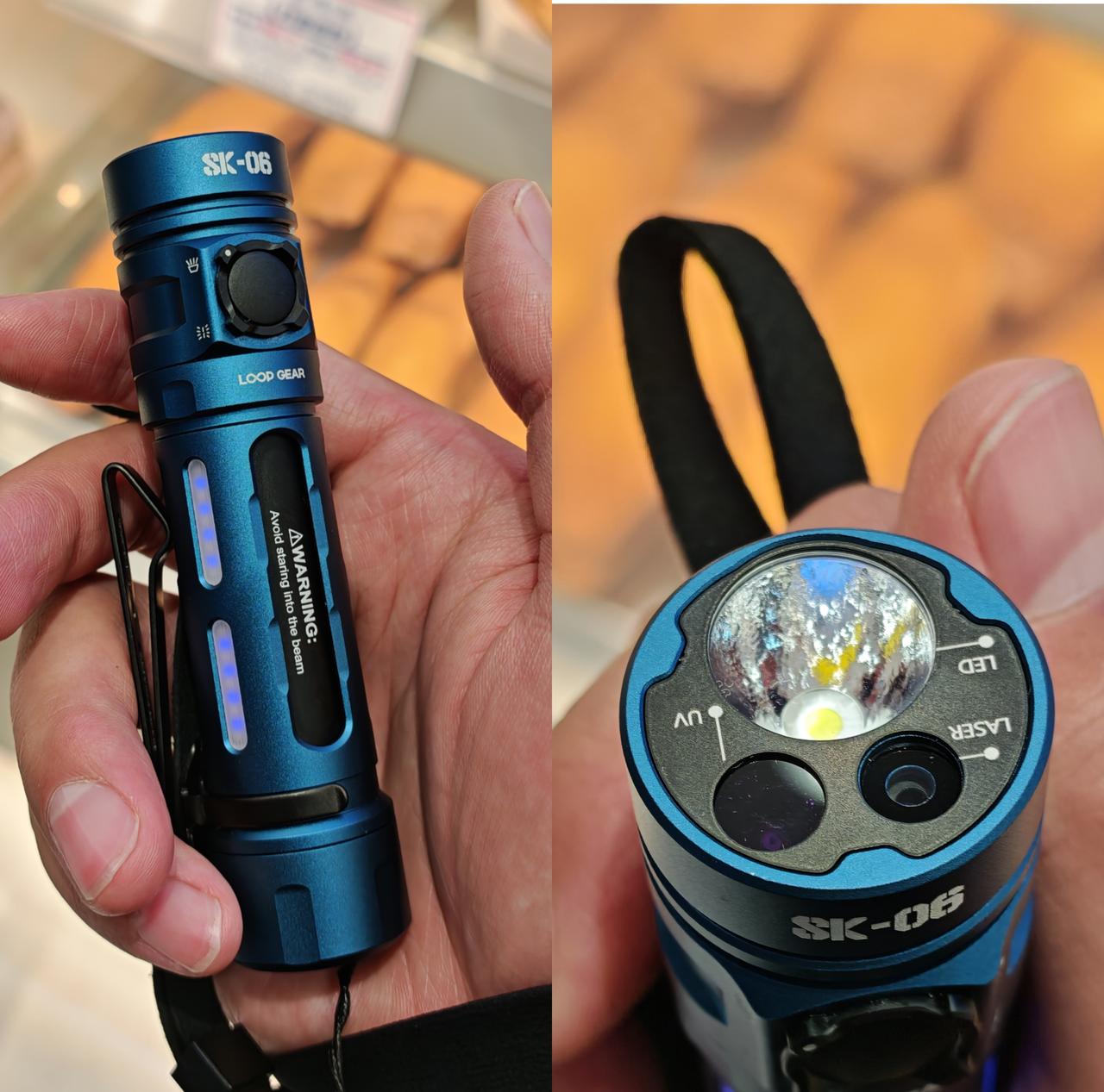 从筒友这里淘了一直全新LOOP SK06蓝色板，白光，UV，激光———三光合一，
