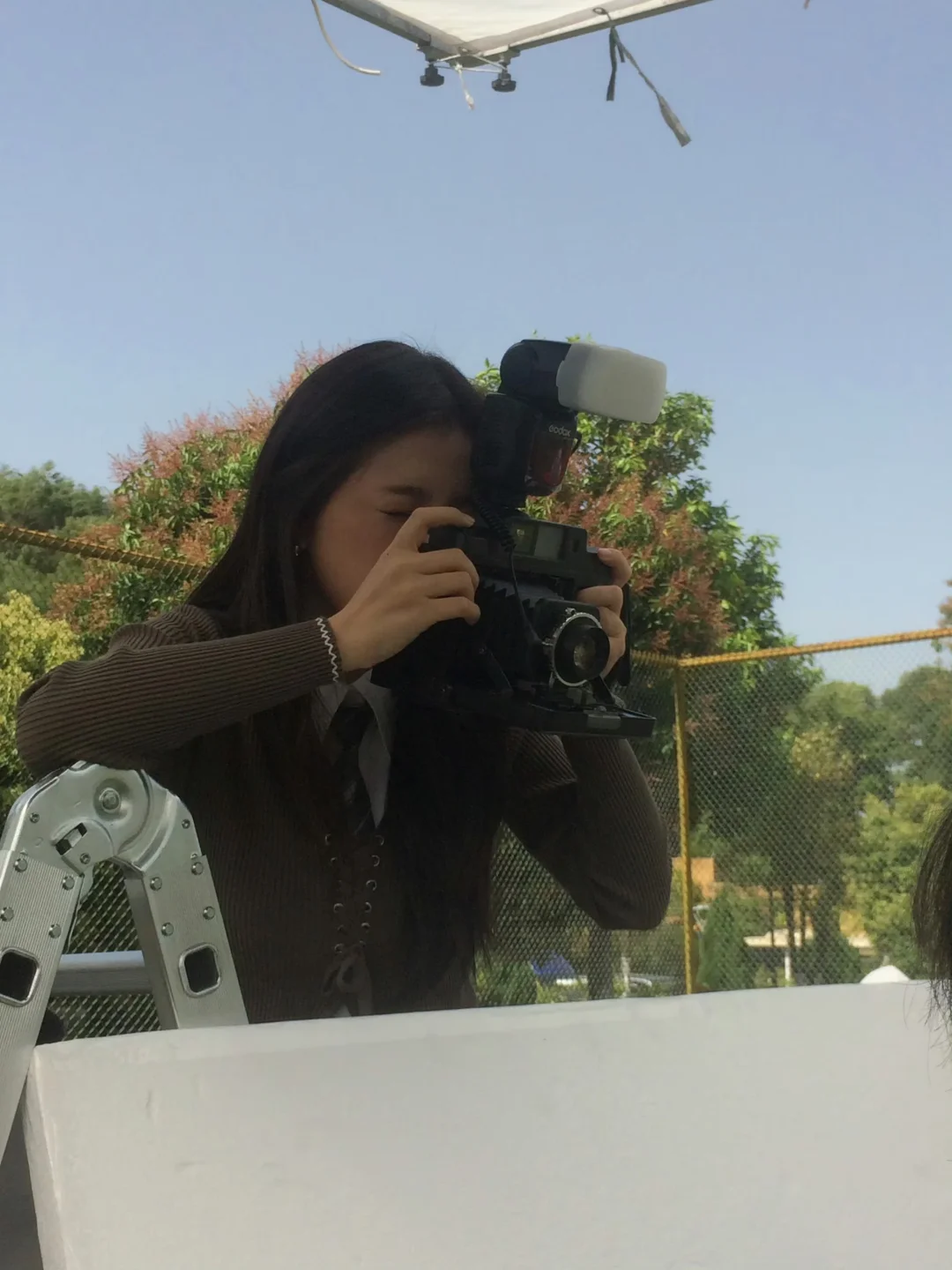 她拍的